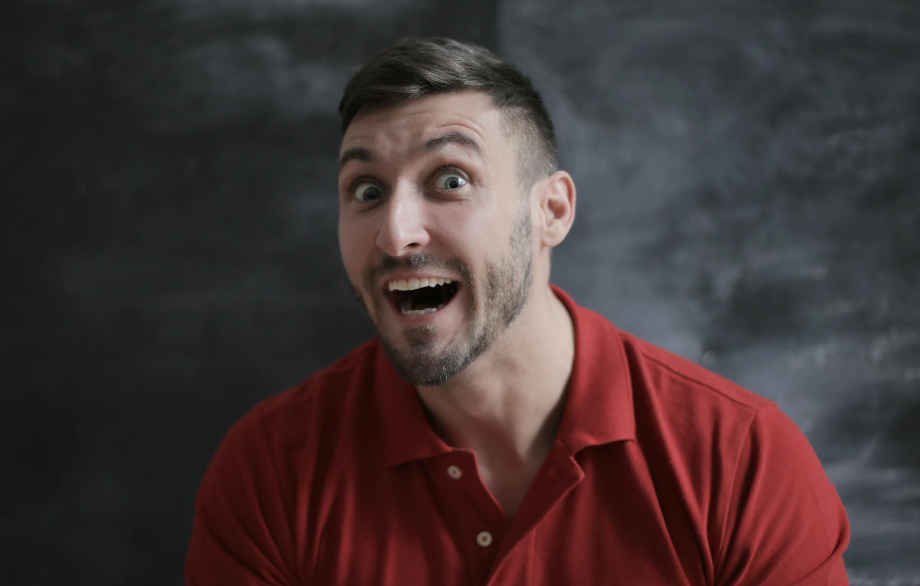 man in red polo shirt